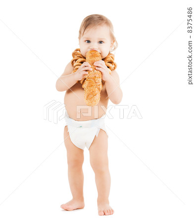cute todler eating long bread 8375486
