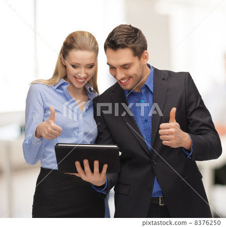 man and woman with tablet pc man and woman with tablet pc 8376250