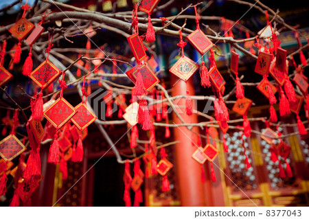 wish cards in a Buddhist temple in Beijing 8377043