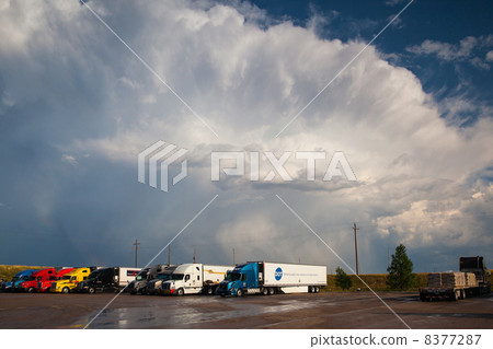 On a parking place before heavy storm in Wyoming On a parking place before heavy storm in Wyoming 8377287
