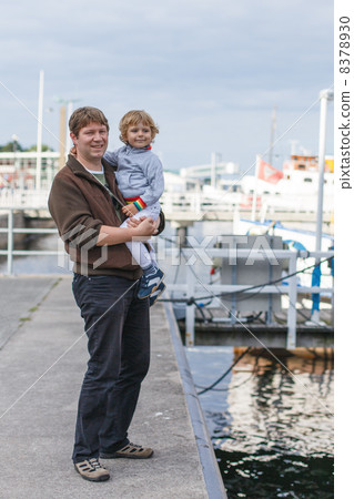 Little boy and happy father having fun in city harbor, Germany 8378930