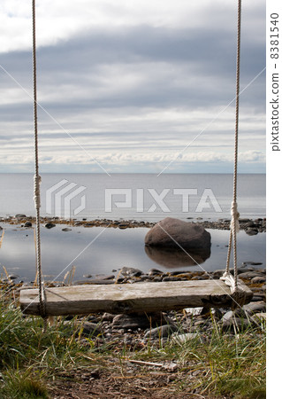 wooden swing with ropes wooden swing with ropes 8381540