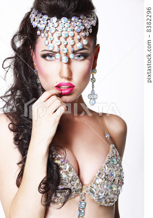 Refined Showy Woman with Bright Diadem and Shining Bra Refined Showy Woman with Bright Diadem and Shining Bra 8382296