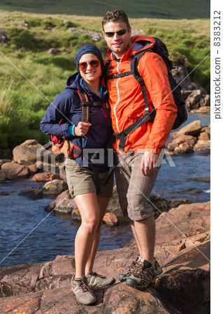 Smiling couple on a hike 8383212