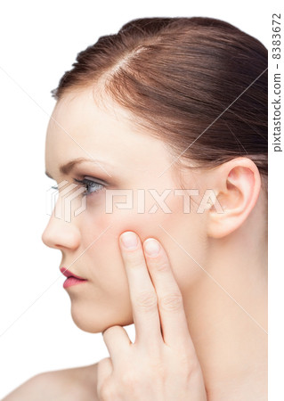 Thinking attractive brunette posing Thinking attractive brunette posing 8383672