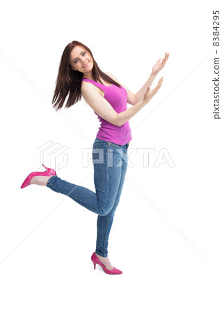 Cheerful stylish brunette wearing high shoes posing Cheerful stylish brunette wearing high shoes posing 8384295