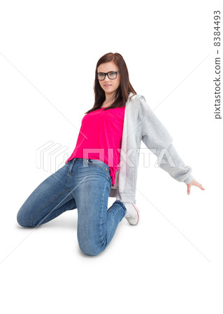 Smiling young woman making hip hop pose 8384493