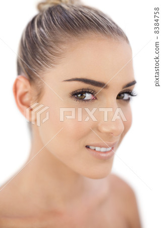 Smiling woman looking at camera 8384758
