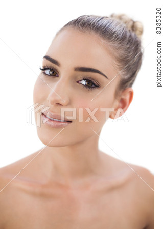 Happy woman looking at camera Happy woman looking at camera 8385320