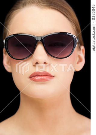 Classy blonde model wearing sunglasses Classy blonde model wearing sunglasses 8385843