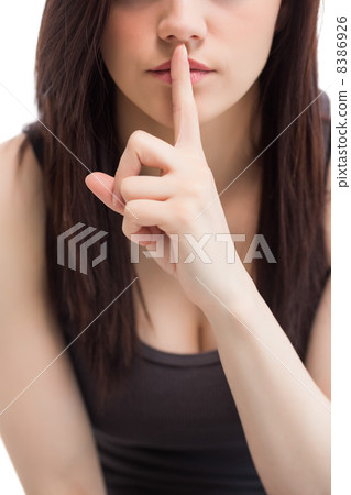 Close up on cute brunette keeping secret 8386926