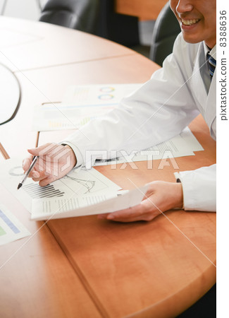 Male with a smiling white coat Male with a smiling white coat 8388636