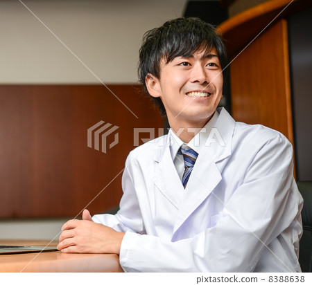 Male with a smiling white coat 8388638