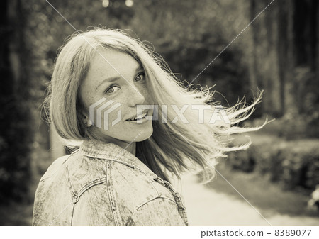 beautiful young woman outdoors 8389077