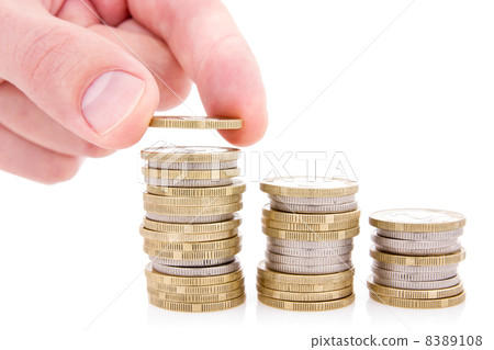 Hand put coin to money stairs 8389108