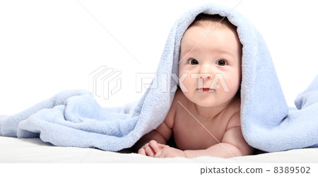 beautiful baby after bath under a blanket 8389502