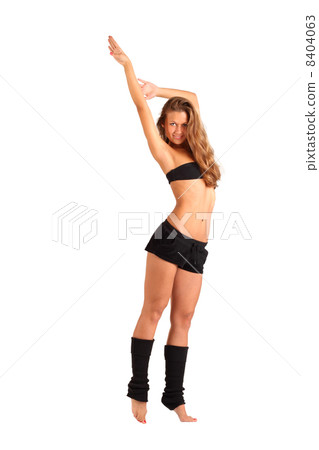 beautiful girl stretches and stands on tiptoes isolated on white beautiful girl stretches and stands on tiptoes isolated on white 8404063
