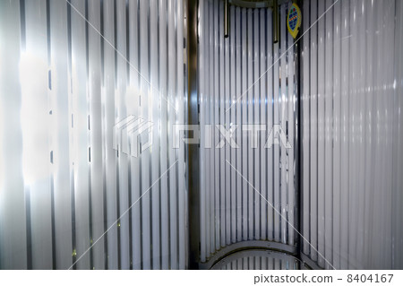 Inside the vertical tanning booth. 8404167