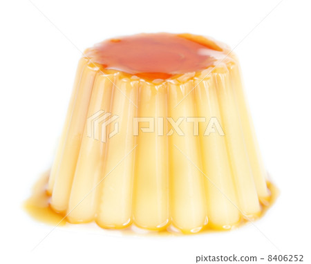 Delicious yogurt pudding with caramel. On a white background. 8406252