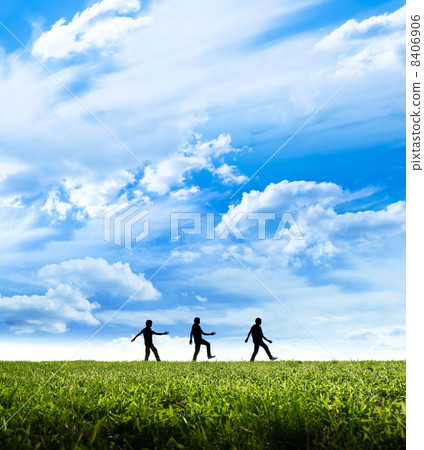 Three men walking in the field 8406906