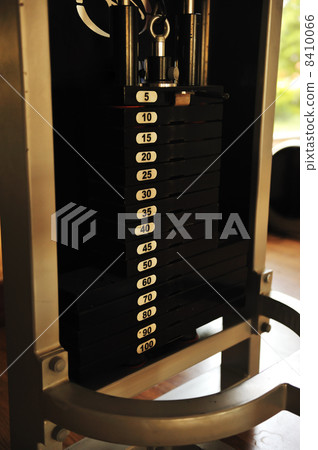 Stack of rusty metal weights in gym bodybuilding equipment Stack of rusty metal weights in gym bodybuilding equipment 8410066