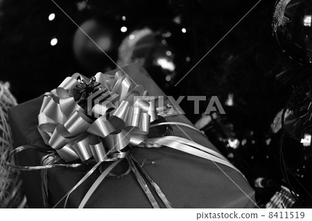 Christmas background with various of gifts and green fir tree Christmas background with various of gifts and green fir tree 8411519