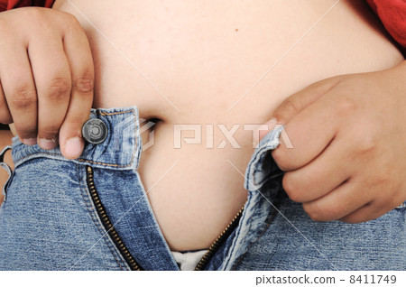 Chubby kid trying to wear pants 8411749