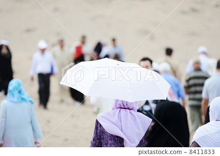 Pilgrims at jabal Arafat walking 8411833
