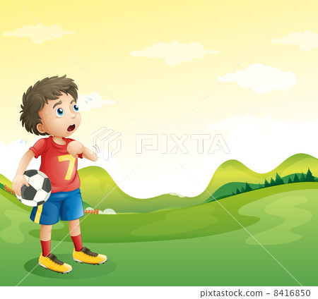 A tired young soccer player in his red uniform 8416850