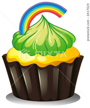 A cupcake with a green icing A cupcake with a green icing 8417024