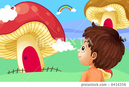 A young boy watching the giant mushroom houses A young boy watching the giant mushroom houses 8418356