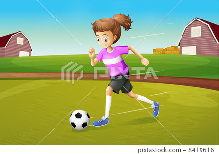 A girl playing football at the farm A girl playing football at the farm 8419616