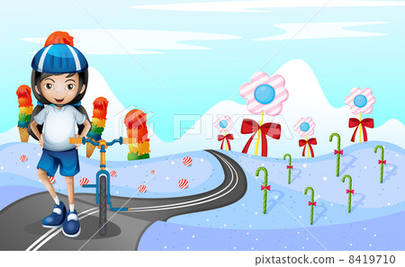 A girl with a bike at the road surrounded with sweets 8419710