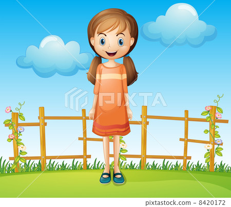 A little woman standing near the wooden fence A little woman standing near the wooden fence 8420172