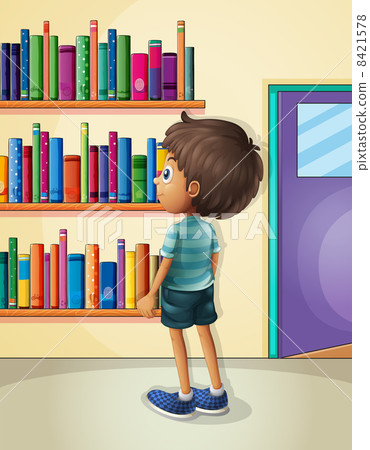 A boy inside the library 8421578