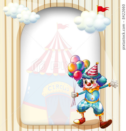 A clown with balloons at the entrance of the carnival A clown with balloons at the entrance of the carnival 8422660