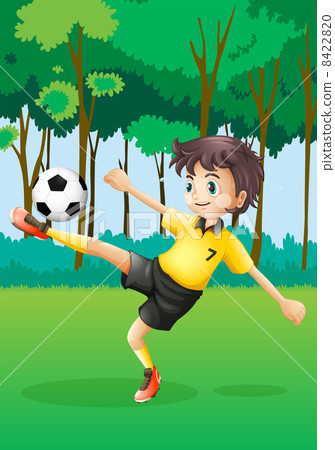 A boy playing soccer at the forest 8422820