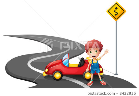 A young boy near a yellow signage with his car A young boy near a yellow signage with his car 8422936