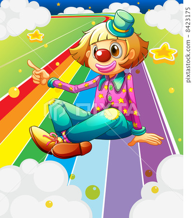 A female clown sitting at the colorful road 8423175