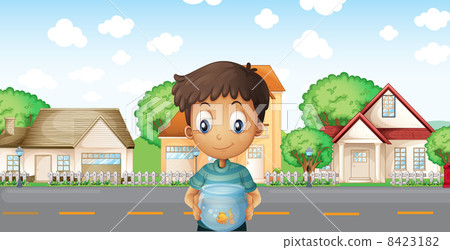 A boy with an aquarium standing across the neighborhood A boy with an aquarium standing across the neighborhood 8423182