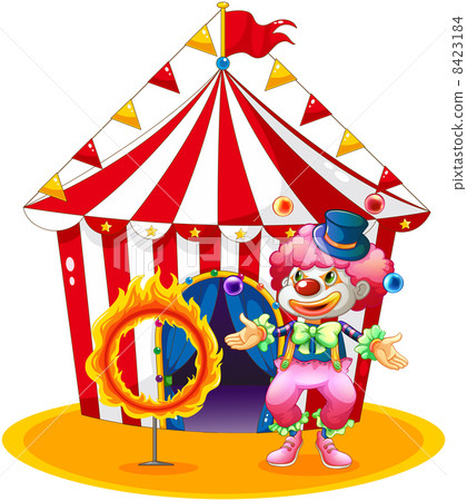 A female clown juggling in front of the tent 8423184