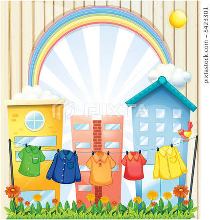 Hanging clothes at the garden near the tall buildings 8423301