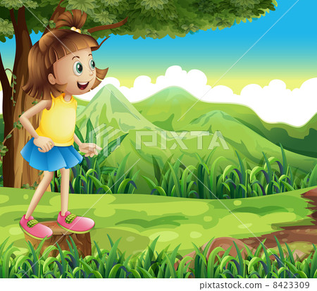 A happy girl standing above a stump at the hill 8423309