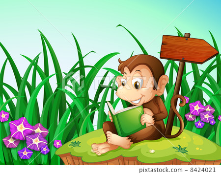 A monkey reading a book beside the arrowboard A monkey reading a book beside the arrowboard 8424021