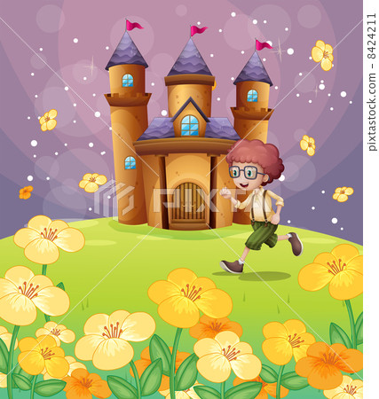 A boy running in front of the castle with flowers 8424211