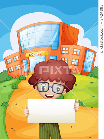 A boy holding an empty signage standing in front of the school A boy holding an empty signage standing in front of the school 8424893