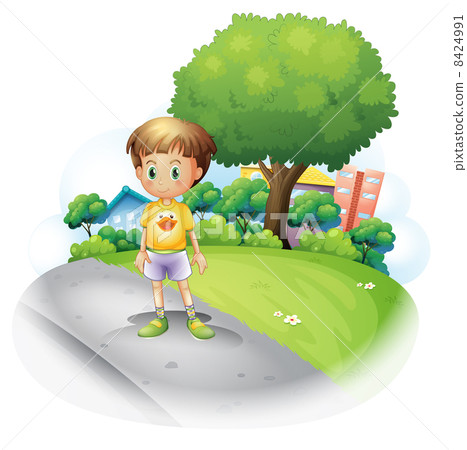 A little boy at the road across the high buildings A little boy at the road across the high buildings 8424991