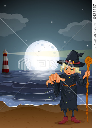 An old witch holding a stick at the beach An old witch holding a stick at the beach 8425367