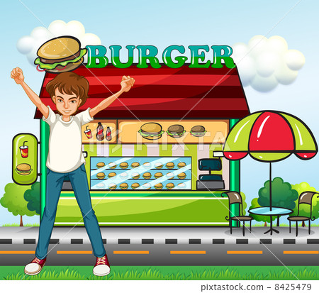 A man in front of the burger stand A man in front of the burger stand 8425479