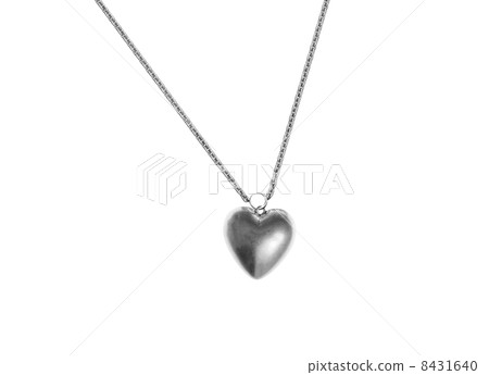 Metallic heart shape in chain isolated on white. Close-up. Metallic heart shape in chain isolated on white. Close-up. 8431640